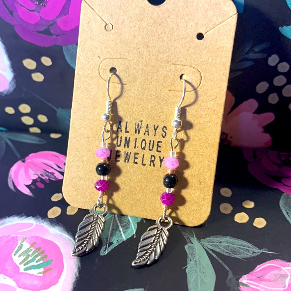 Feather charm dangling earrings